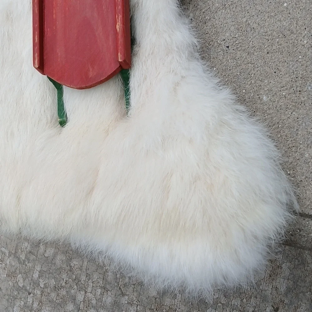 White Rabbit Fur Christmas Stocking with Red and Green Sled